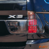 Smoked Black LED Tail Lights & Tail Gate Garnish for BMW X5 E53 2000 - 2003 Pre LCI - Mars Performance
