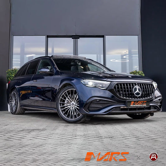 Modified Mercedes-Benz wagon with Mars Performance wheels parked in front of showroom in Melbourne.