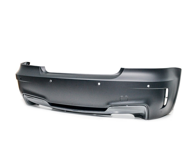 Detailed view of rear bumper diffuser with twin exhaust space on BMW E88