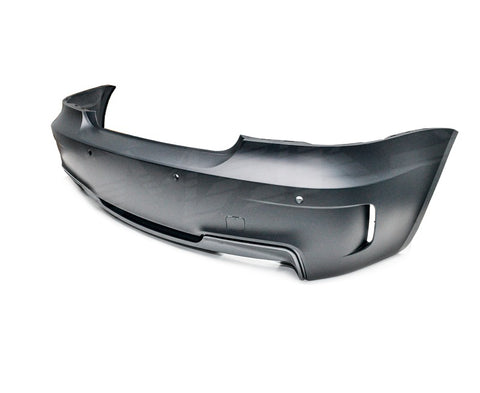 Close-up of twin exhaust outlets on 1M Style Rear Bumper for BMW 1-Series